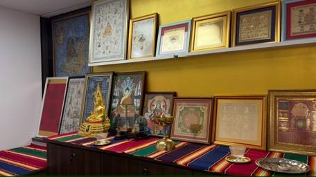 Buddha statues with Thai yantra wall art