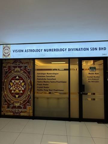 Vision Astrology storefront at Lot 208B